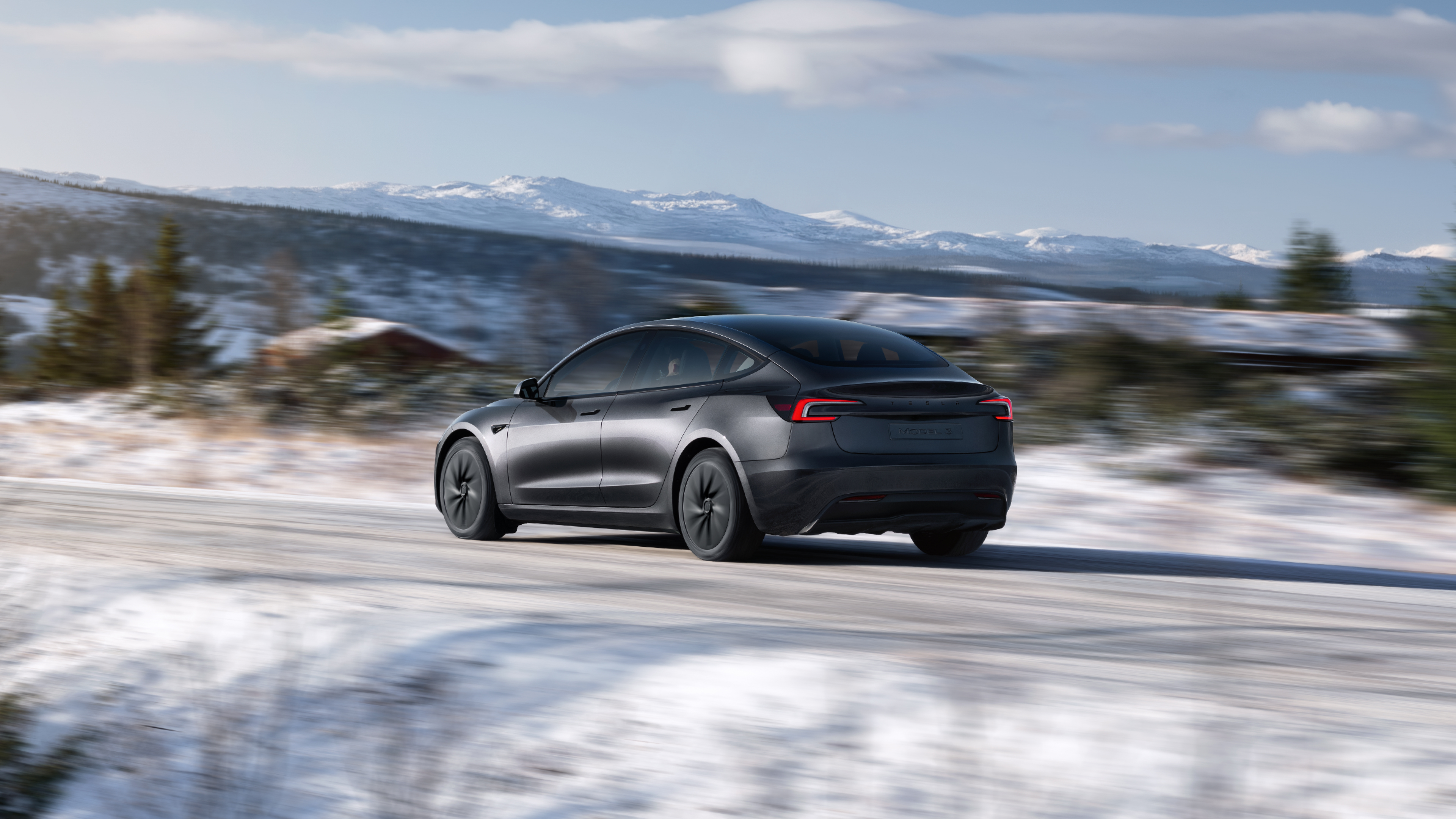 2026 Tesla Model 3 RWD — Rear three-quarter