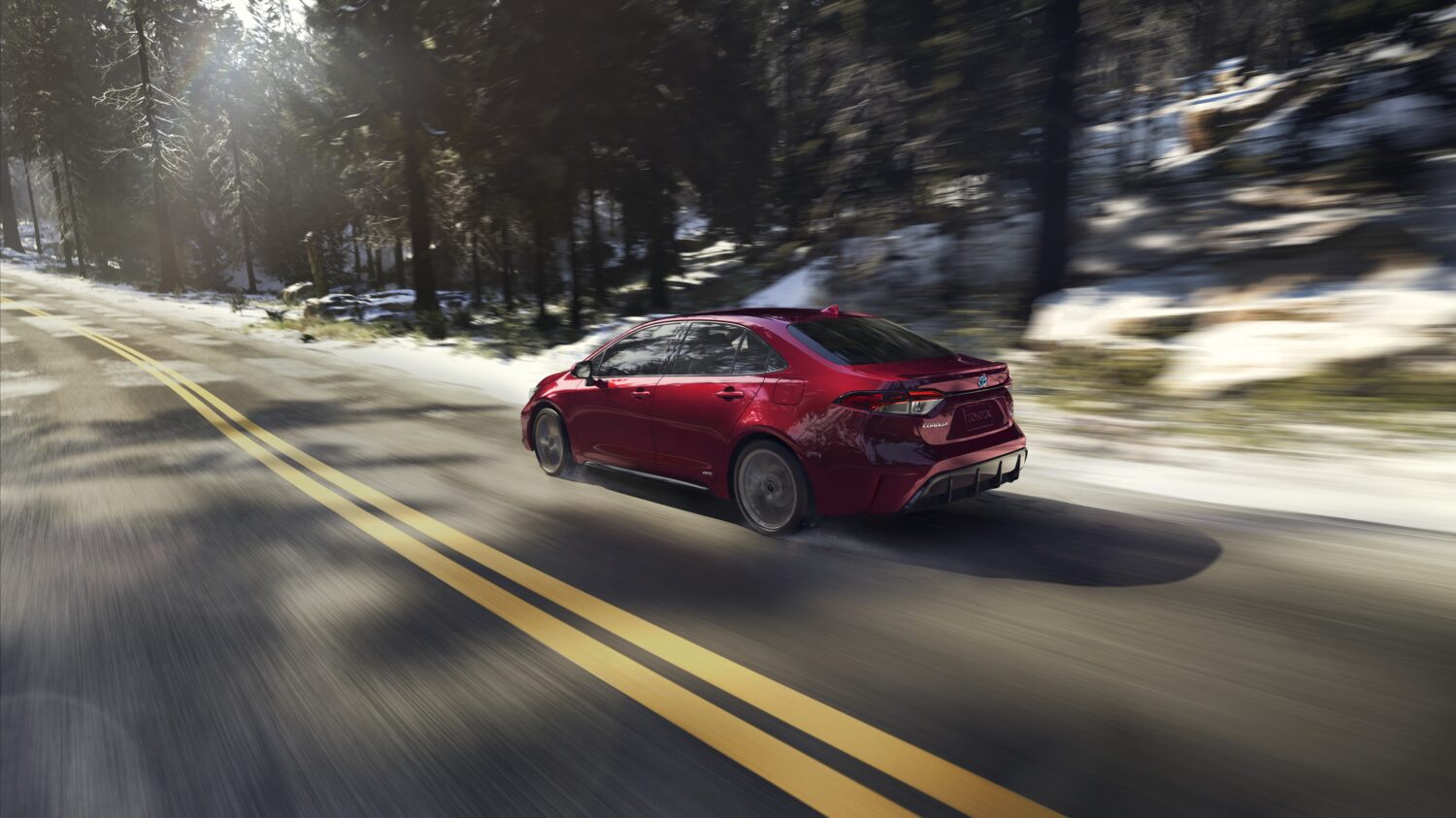 2026 Toyota Corolla Hybrid LE (FWD) — Rear three-quarter