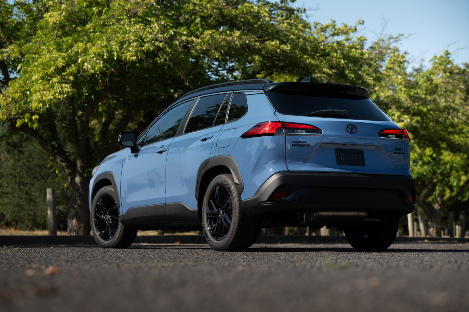 2026 Toyota Corolla Cross Hybrid XSE AWD — Rear three-quarter
