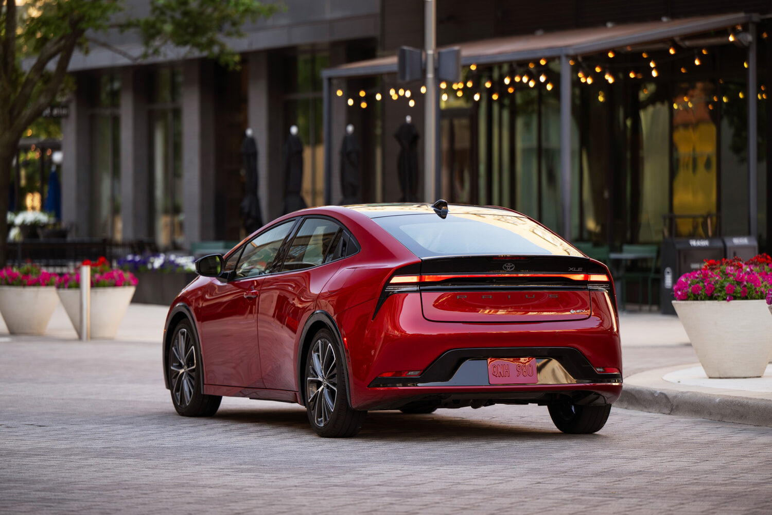 2026 Toyota Prius XLE — Rear three-quarter