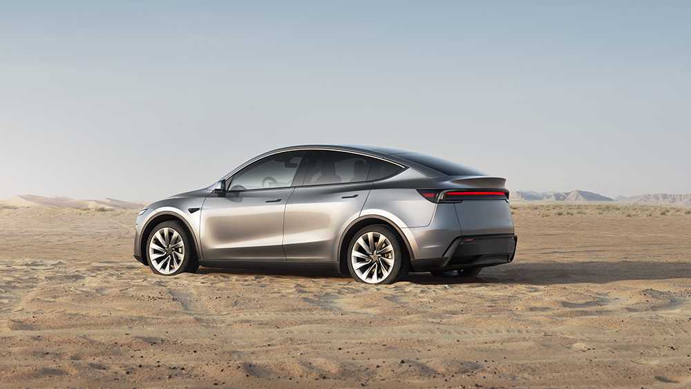 2026 Tesla Model Y Premium AWD — Rear three-quarter