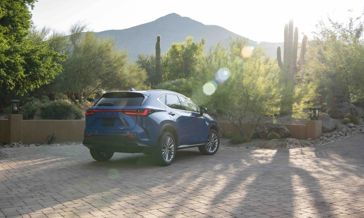 2026 Lexus NX 350h AWD Premium — Rear three-quarter